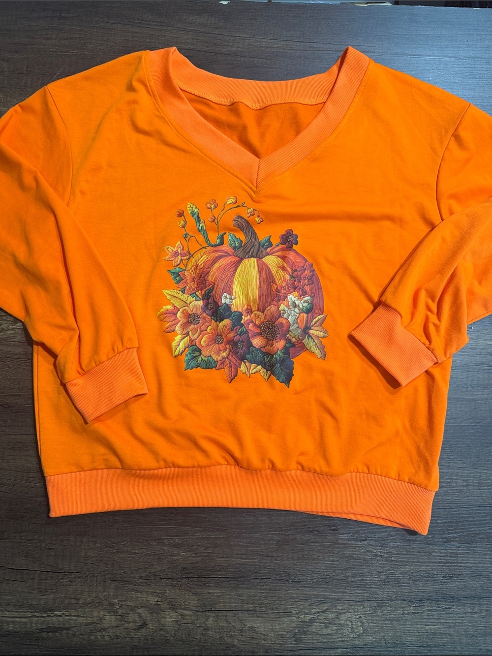 Women's Orange V-Neck Sweater with Pumpkin Floral Graphic
